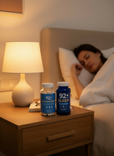 Load image into Gallery viewer, 92+ Calm & Restore Stress Relief Bundle Ashwagandha and Sleep Support capsules on nightstand with sleeping woman in background