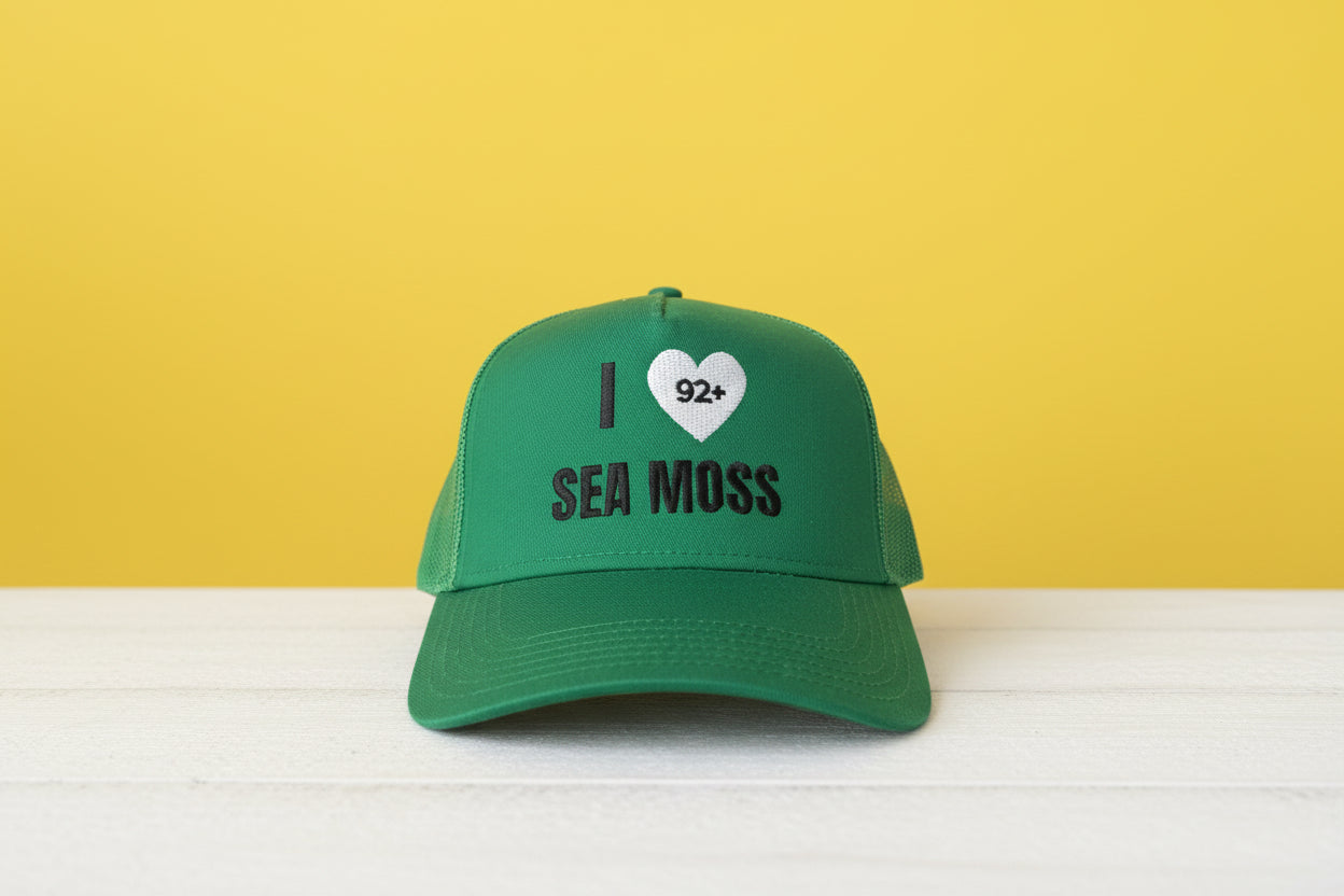 Green 92+Signature Cap trucker hat with I heart 92+ Sea Moss design, 100% cotton