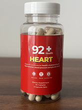 Load image into Gallery viewer, 92+ Heart supplement bottle with Herbia Del Sapo capsules supporting cardiovascular health and balanced cholesterol levels

